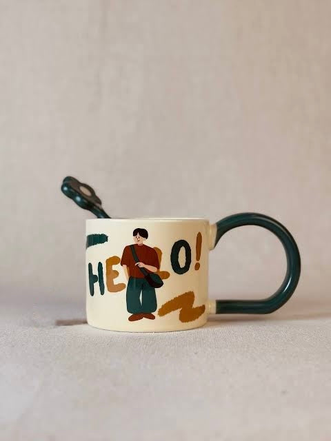Porcelain mug with spoon